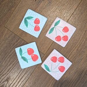 NWT 4 PIECE GANZ COASTER SET.. #6448
